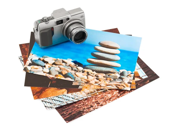 Camera and photo printouts (my photos) — Stock Photo, Image