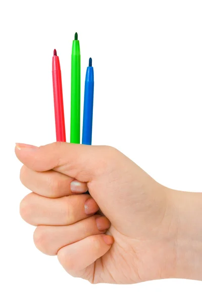 Hand med mångfärgade pennor — Stockfoto