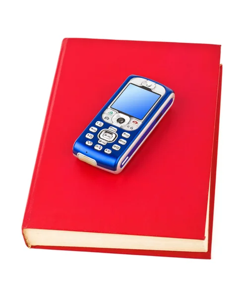 Mobile phone on book — Stock Photo, Image