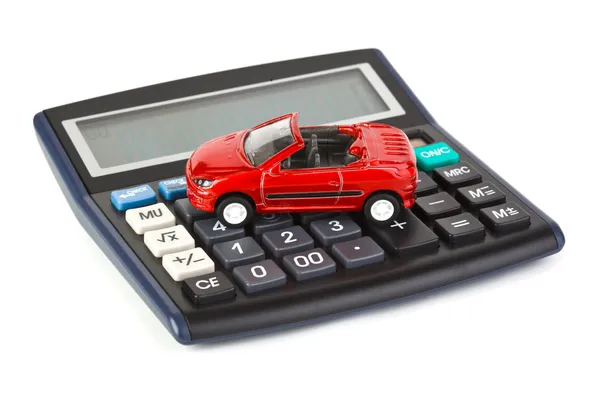 Miniräknare och leksak bil — Stockfoto