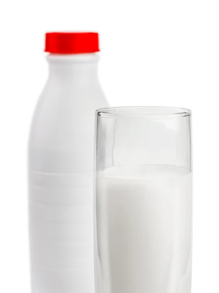 Láhev mléka a sklo — Stock fotografie