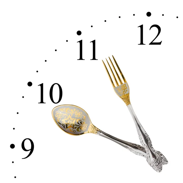 Klocka gjord av sked och gaffel — Stockfoto