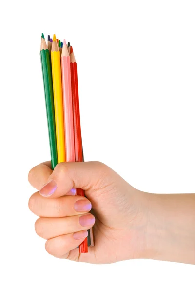Hand met veelkleurige potloden — Stockfoto