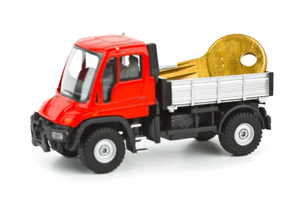 Игрушечный грузовик с ключом — стоковое фото