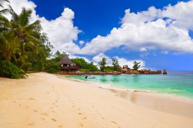 Tropical beach at Seychelles clipart