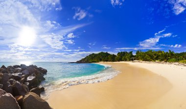 Panorama of tropical beach at evening clipart