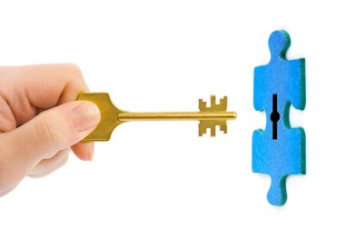 Hand with key and puzzle clipart