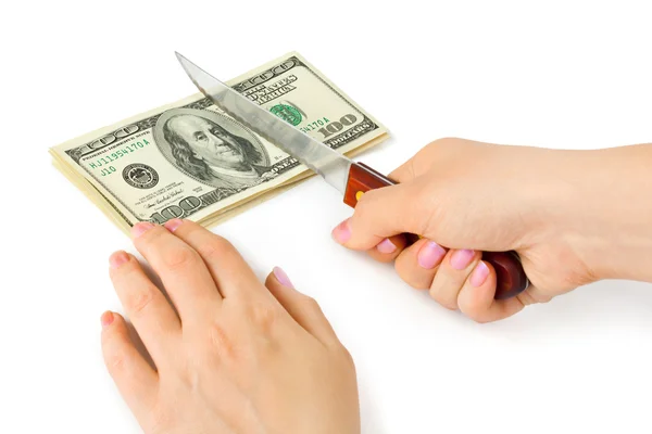 Hand met mes snijden geld — Stockfoto