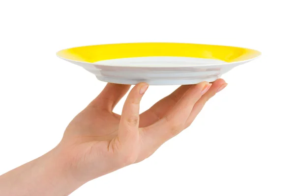 Hand with plate — Stock Photo, Image