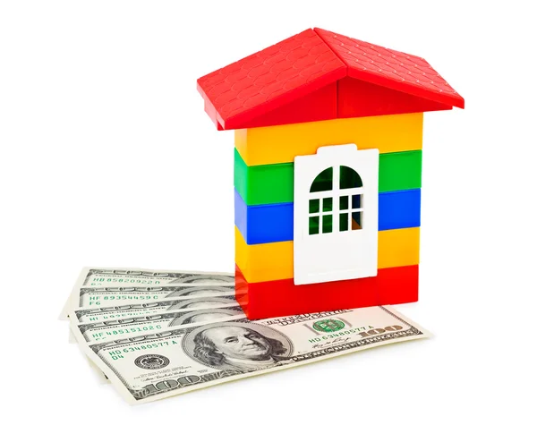 Zabawka dom i pieniądze — Zdjęcie stockowe