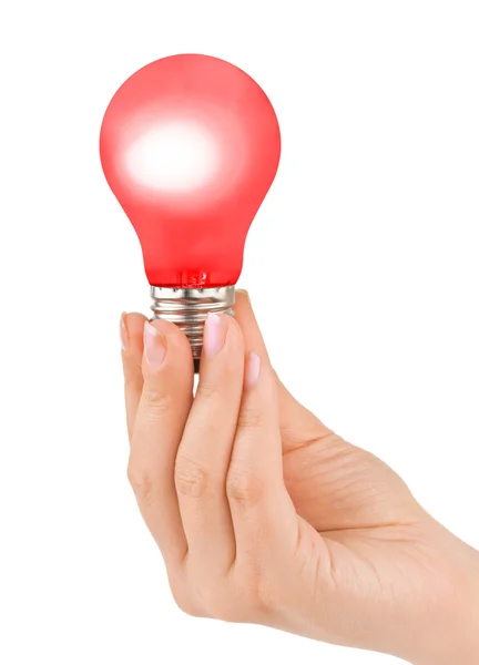 Mão com lâmpada vermelha — Fotografia de Stock