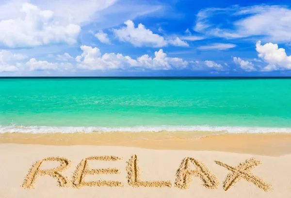 Word Relax on beach — Stock Photo, Image