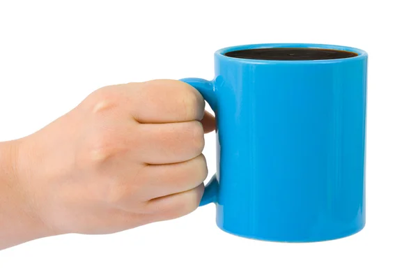 Рука с чашкой чая — стоковое фото