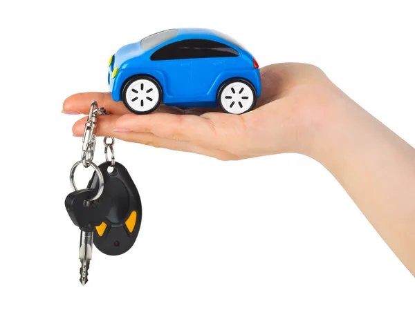 Hand with keys and car — Stock Photo, Image
