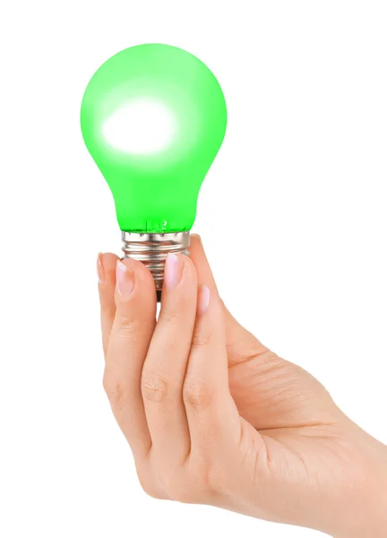Hand med grön lampa — Stockfoto