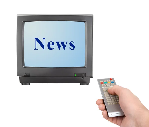 Hand met afstandsbediening en tv nieuws — Stockfoto