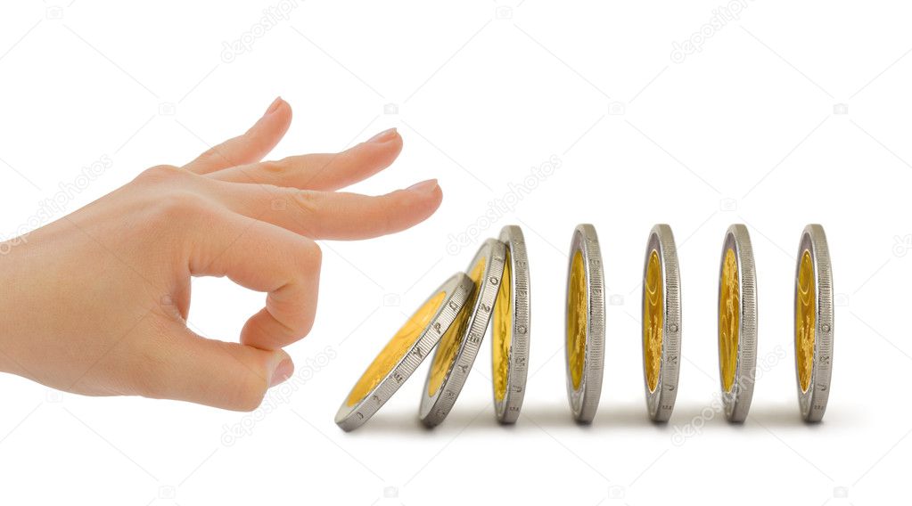 Hand and falling coins