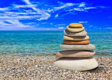 Stack of stones on beach clipart