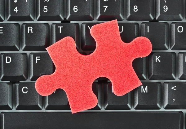 Puzzle a počítačové klávesnice — Stock fotografie