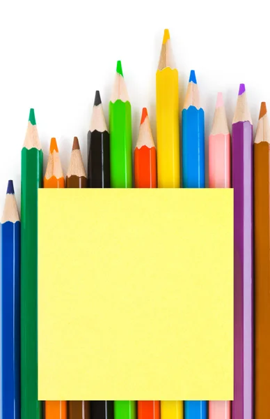 Lápices multicolores y papel — Foto de Stock