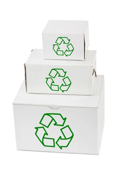 Stapel von Kartons mit Recyclingschild — Stockfoto