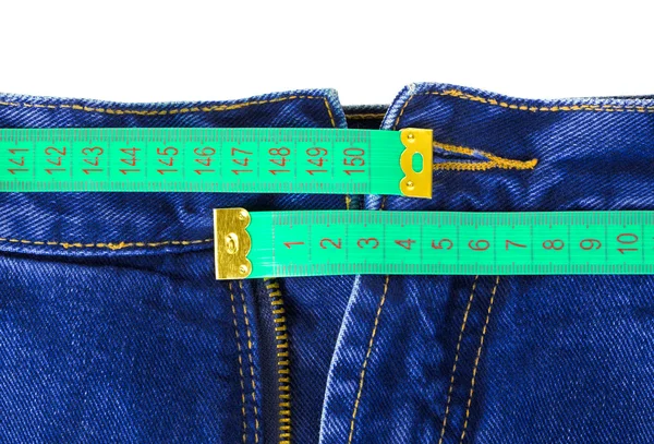Calça jeans e fita métrica — Fotografia de Stock