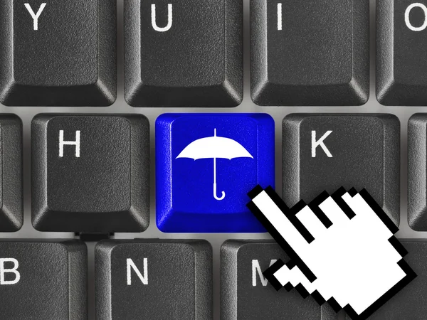 Toetsenbord van de computer met paraplu sleutel — Stockfoto