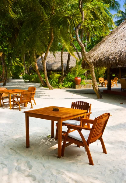 Cafe on the beach of tropical island — Stock Photo, Image