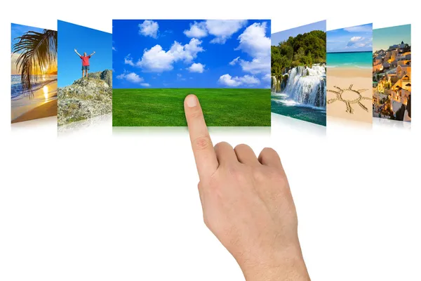 Hand scrolling nature and travel photography — Stock Photo, Image