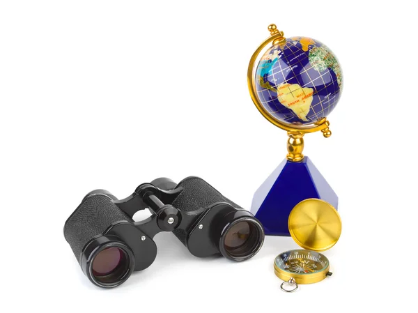 Verrekijkers, kompas en globe — Stockfoto