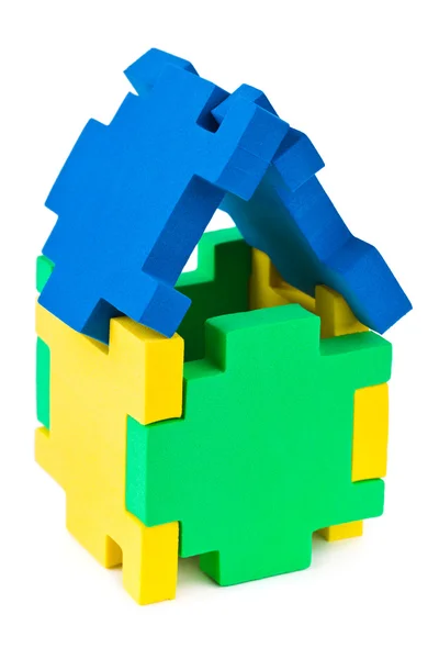 Huis gemaakt van puzzel — Stockfoto
