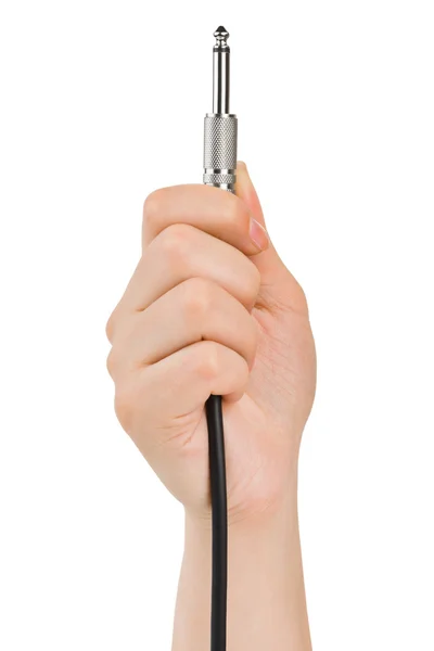 Mão com cabo de áudio — Fotografia de Stock