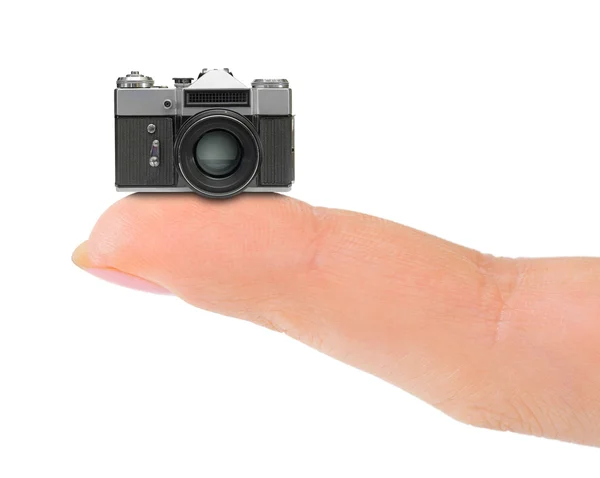 Finger and camera — Stock Photo, Image