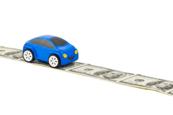 Toy car on money road — Stock Photo, Image