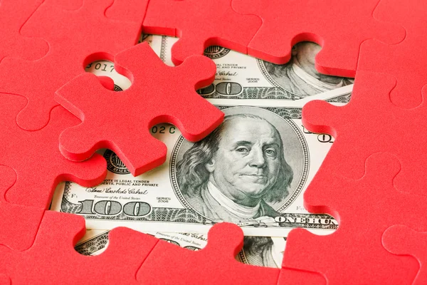 Money and puzzle — Stock Photo, Image