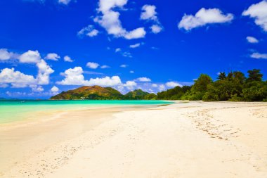 Tropical beach Cote d'Or at island Praslin, Seychelles clipart