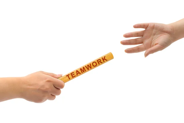 Handen en estafette teamwork — Stockfoto