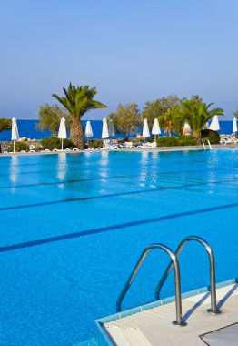 Water pool and stairs - vacation background