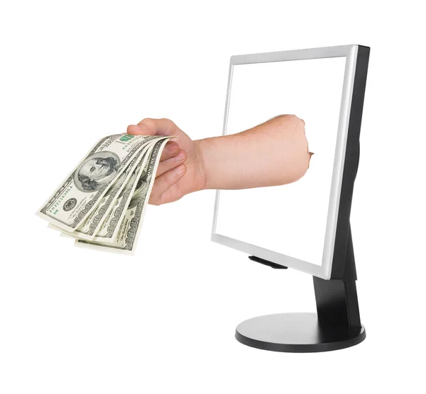 stock image Hand with money and computer monitor isolated on white background