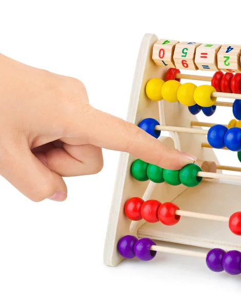 Hand och abacus — Stockfoto