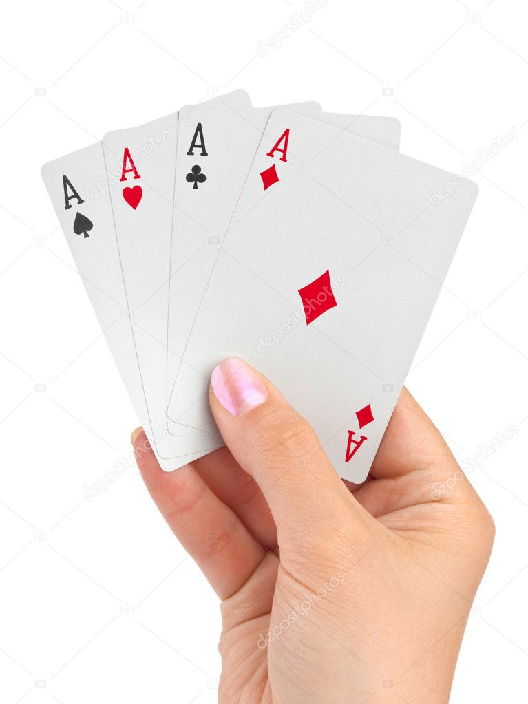 Hand with four aces isolated on white background