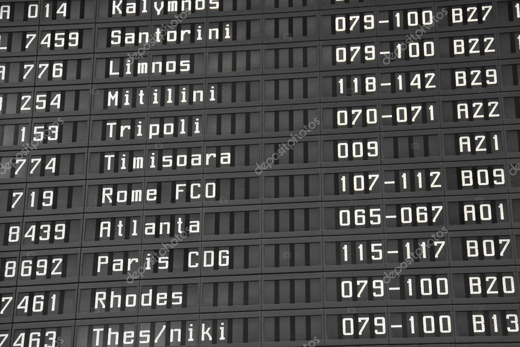 Flight information board in airport — Stock Photo © Violin #4854766