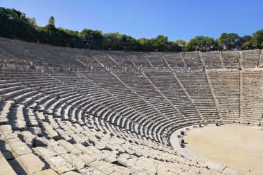 Ruins of Epidaurus amphitheater, Greece - archaeology background clipart