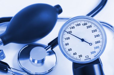 Scale of pressure and stethoscope clipart