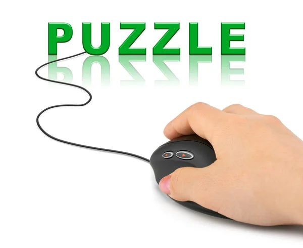 Ruka s počítačové myši a slovo puzzle — Stock fotografie
