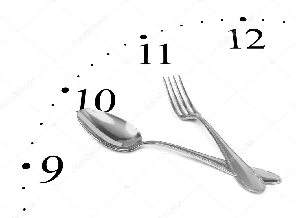 Clock made of fork and spoon isolated on white background
