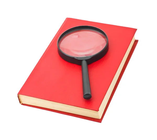 Magnifying glass and book — Stock Photo, Image