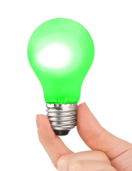 Mão com lâmpada verde — Fotografia de Stock