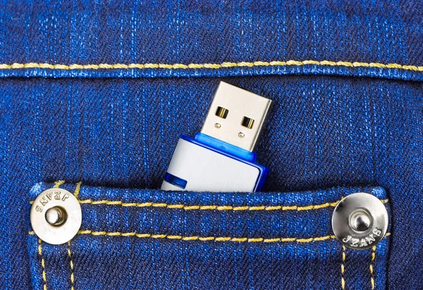 Flash memory in jeans pocket — Stock Photo, Image