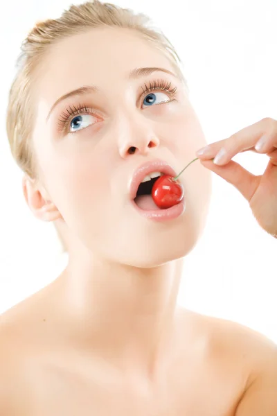 Happy health woman eating cherry — Stock Photo, Image